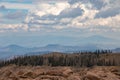 Windswept Mountain Top with Storm Clouds Royalty Free Stock Photo