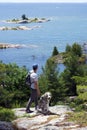 Man and Dog Hiking in Killarney Provincial Park, Ontario Royalty Free Stock Photo