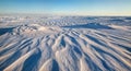 Windswept Snow Formations Sastrugi with Sculptural Ridge Patterns and Strong Side Lighting Royalty Free Stock Photo