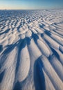 Windswept Snow Formations Sastrugi with Sculptural Ridge Patterns and Strong Side Lighting Royalty Free Stock Photo