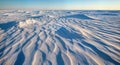 Windswept Snow Formations Sastrugi with Sculptural Ridge Patterns and Strong Side Lighting Royalty Free Stock Photo