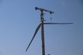 Windturbine in close-up with blue sky as background in the Netherlands. Royalty Free Stock Photo