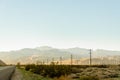 Windturbine field in California with mountains Royalty Free Stock Photo