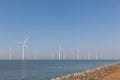 Windturbines in the water producing alternative energy Royalty Free Stock Photo