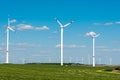 Windwheels in a grass field in Germany Royalty Free Stock Photo