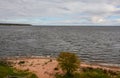 Windy autumn day on the shore of lake Ladoga. Royalty Free Stock Photo