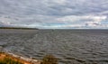 Windy autumn day on the shore of lake Ladoga. Royalty Free Stock Photo