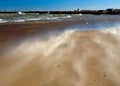 Windy day on sandy beach Royalty Free Stock Photo