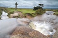 Windy Post cross and small waterfall. Dartmoor, Devon. Long exposure.