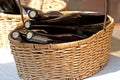 Some wine bottles in a basket