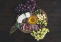 Wine appetizers set: meat and cheese selection, honey, grapes, w Royalty Free Stock Photo