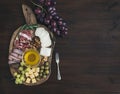 Wine appetizers set: meat and cheese selection, honey, grapes Royalty Free Stock Photo