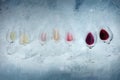 Wine background with many glasses of rose, red, and white wine, overhead shot Royalty Free Stock Photo