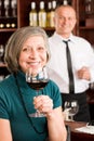 Wine bar senior woman enjoy wine glass Royalty Free Stock Photo