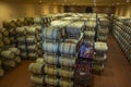 Wine barrels in the cellar of the winery. Wine barrels in wine vaults. Producer: Antinori Bolgheri, Tuscany, Italy