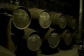 Wine Barrels in a dark warehou