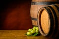 Wine barrels and grapes Royalty Free Stock Photo