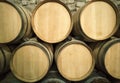 Wine barrels stacked in the cellar of the winery Royalty Free Stock Photo