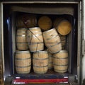 Wine barrels stacked in Truck ,Loading dock, Bordeaux Vineyard Royalty Free Stock Photo