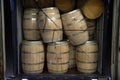 Wine barrels stacked in Truck ,Loading dock, Bordeaux Vineyard Royalty Free Stock Photo