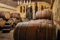 Wine Barrels Stacked in Winery Cellar Royalty Free Stock Photo