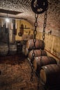 Wine Barrels Stacked in Winery Cellar Royalty Free Stock Photo