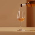 Wine being poured from bottle into stemware on table Royalty Free Stock Photo