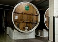 Wine in big wooden barrels in Massandra winery, Yalta, Crimea Royalty Free Stock Photo