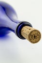 Blue bottle wine with a cork isolated on white bac Royalty Free Stock Photo