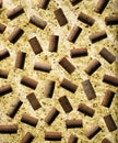 Wine bottle corks arranged on cork background Royalty Free Stock Photo