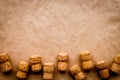 Wine bottle corks pattern on craft paper background top view copyspace. New Year celebration concept Royalty Free Stock Photo