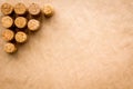 Wine bottle corks pattern on craft paper background top view copyspace. New Year celebration concept Royalty Free Stock Photo