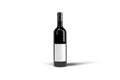 Wine bottle with empty label mockup isolated on white background. Royalty Free Stock Photo