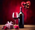 wine bottle and glass, accompanied by roses and a box of chocolates, symbolizing a romantic date Royalty Free Stock Photo