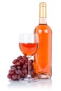 Wine bottle glass alcohol beverage rose grapes isolated on white Royalty Free Stock Photo