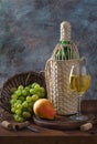 Wine bottle, glass and grapes Royalty Free Stock Photo