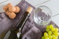 Wine bottle, glass, grapes on table. top view Royalty Free Stock Photo