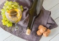 Wine bottle, glass, grapes on table. top view Royalty Free Stock Photo