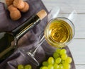 Wine bottle, glass, grapes on table. top view Royalty Free Stock Photo