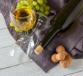 Wine bottle, glass, grapes on table. top view Royalty Free Stock Photo