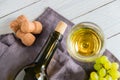 Wine bottle, glass, grapes on table. top view Royalty Free Stock Photo