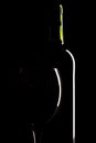 Wine bottle and glass silhouette over black Royalty Free Stock Photo