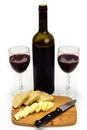 Wine Bottle with Glasses Cheese Bread Angled View Royalty Free Stock Photo