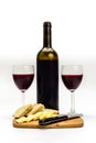 Wine Bottle with Glasses Cheese Bread Royalty Free Stock Photo