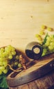 Wine bottle and green grapes Royalty Free Stock Photo