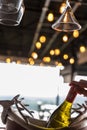 Wine bottle in ice bucket. Wine bottle in bucket with ice. Champagne bottle in ice bucket Royalty Free Stock Photo