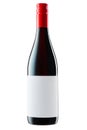 Wine bottle with label and red wine isolated on white background with clipping path Royalty Free Stock Photo