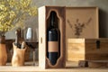 Wine bottle in protective mycelium container highlights mushroom-based, biodegradable approach. Royalty Free Stock Photo