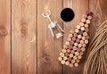 Wine bottle shaped corks, glass of red wine and corkscrew Royalty Free Stock Photo