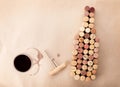 Wine bottle shaped corks, glass of wine and corkscrew Royalty Free Stock Photo